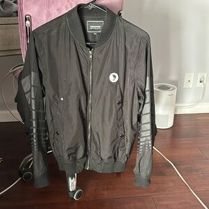 Pink Dolphin black windbreaker jacket with zipper front and 4 button pockets